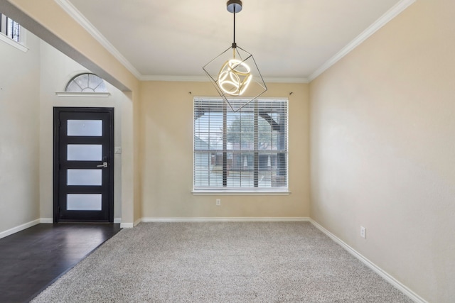 foyer with dark wood-type flooring, ornamental molding, and a chandelier