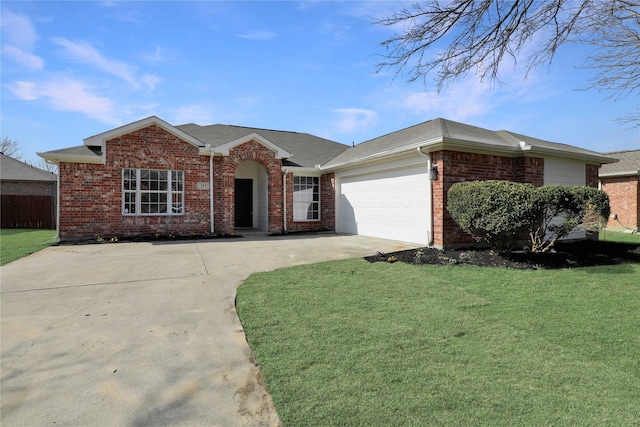 single story home featuring a garage and a front lawn