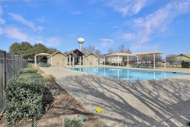 view of swimming pool featuring a gazebo and a patio area