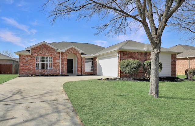 ranch-style home with a garage and a front lawn