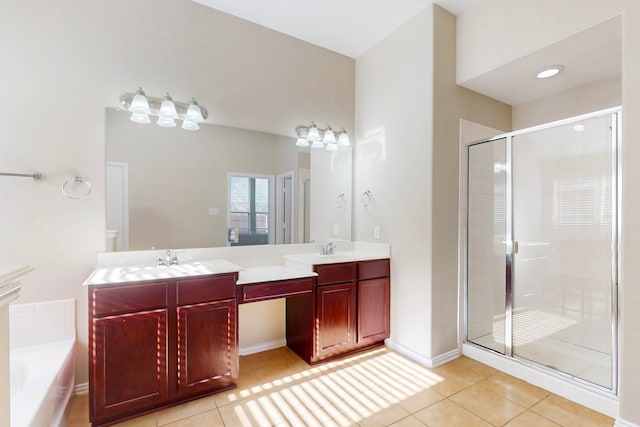 bathroom with tile patterned flooring, vanity, and independent shower and bath