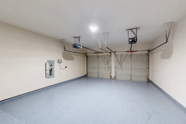 garage featuring a garage door opener and electric panel