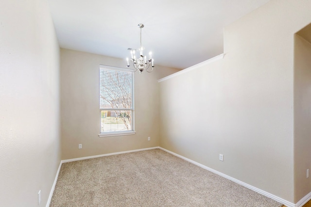 spare room featuring light colored carpet and a notable chandelier