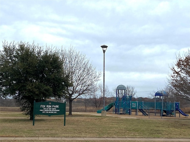 view of jungle gym with a yard