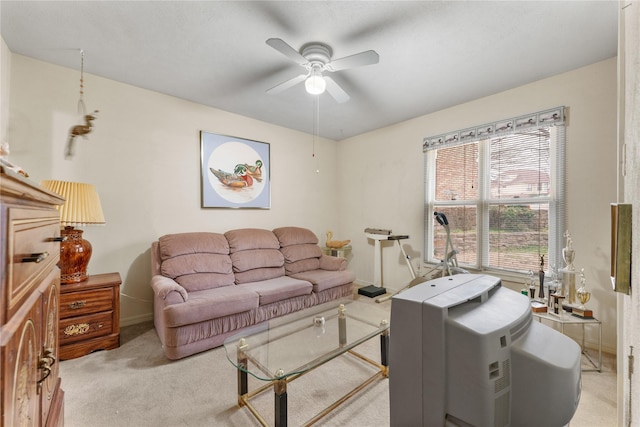 living room featuring light carpet and ceiling fan