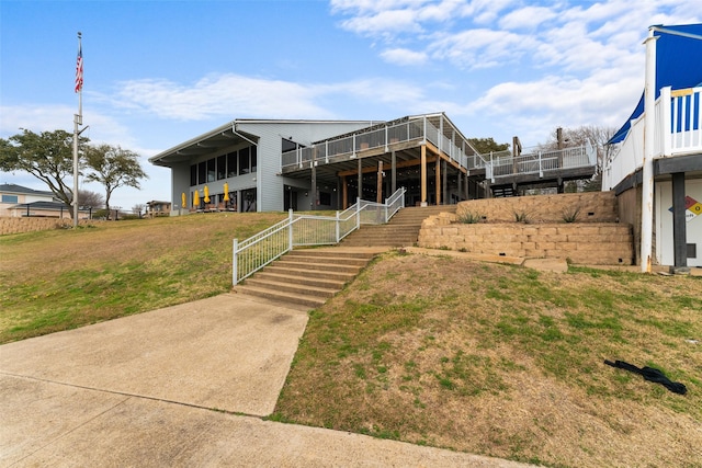 exterior space with a front lawn