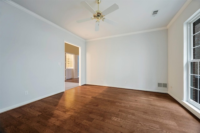 unfurnished room with hardwood / wood-style flooring, crown molding, and ceiling fan