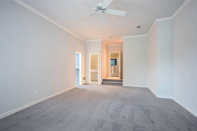 unfurnished room featuring crown molding, ceiling fan, and carpet flooring