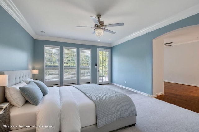 bedroom with crown molding, access to outside, ceiling fan, and hardwood / wood-style flooring