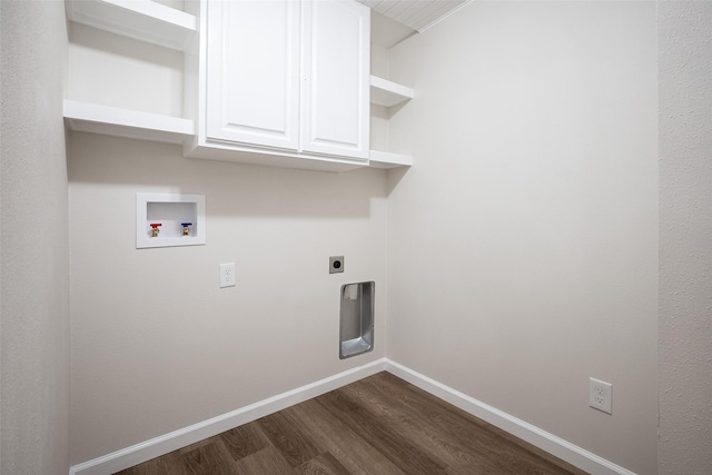 laundry room featuring dark hardwood / wood-style floors, cabinets, washer hookup, and hookup for an electric dryer