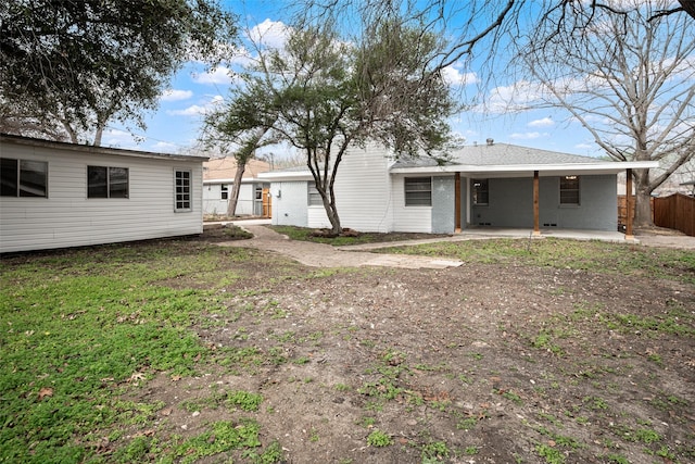 rear view of house featuring a patio area