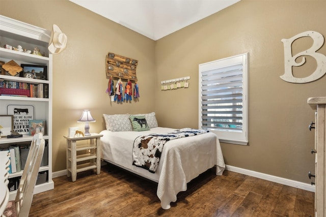 bedroom featuring dark hardwood / wood-style floors