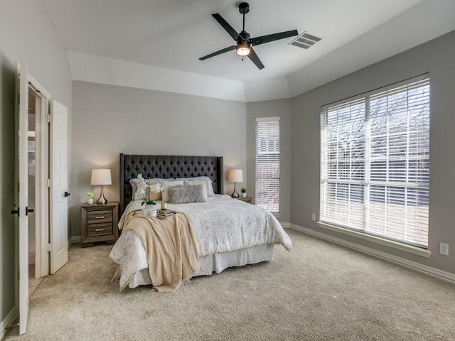 bedroom featuring light colored carpet and ceiling fan