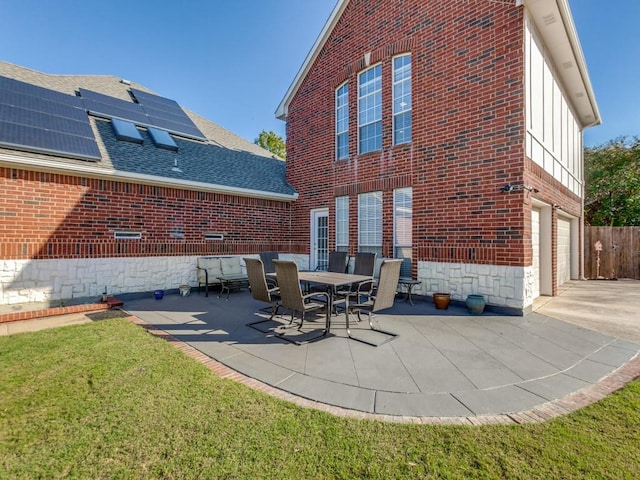 view of patio / terrace with a garage