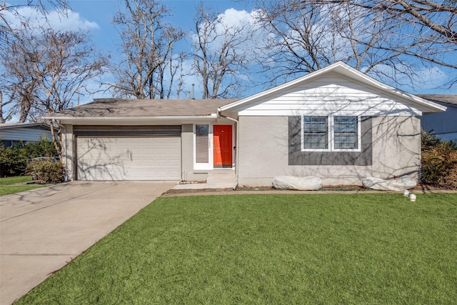 ranch-style home with a garage and a front yard