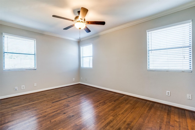 empty room featuring crown molding, ceiling fan, and dark hardwood / wood-style floors