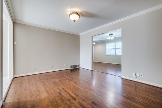 unfurnished room featuring hardwood / wood-style floors, crown molding, and ceiling fan