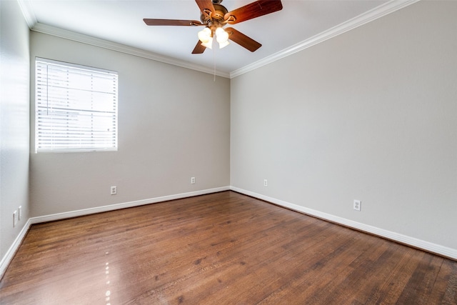 spare room featuring hardwood / wood-style flooring, ornamental molding, and ceiling fan