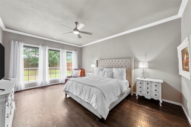 bedroom with ornamental molding, ceiling fan, and dark hardwood / wood-style flooring