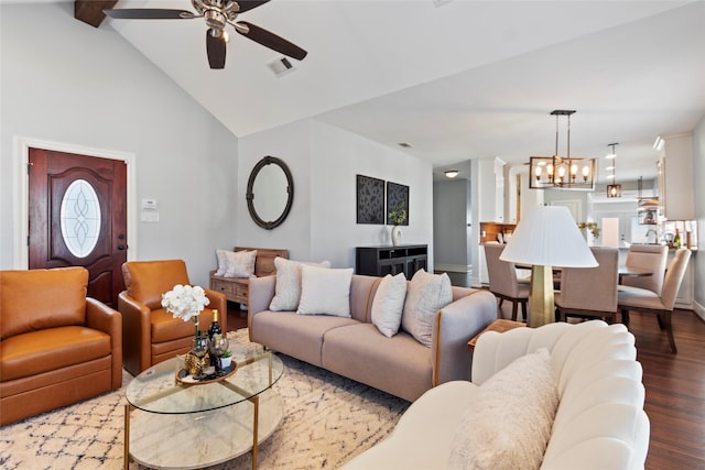 living room with ceiling fan with notable chandelier, wood-type flooring, high vaulted ceiling, and beamed ceiling