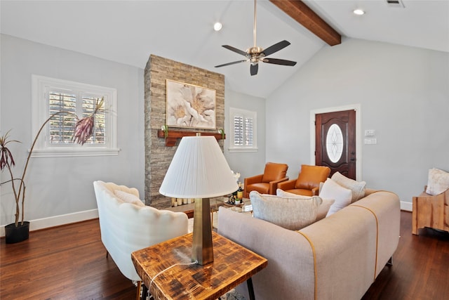 living room featuring dark hardwood / wood-style flooring, vaulted ceiling with beams, and ceiling fan