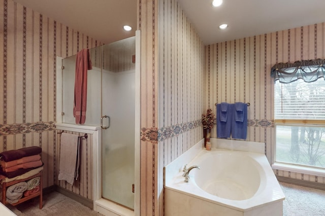 bathroom featuring plus walk in shower