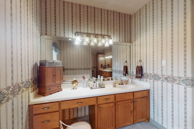 bathroom with vanity and a bathing tub