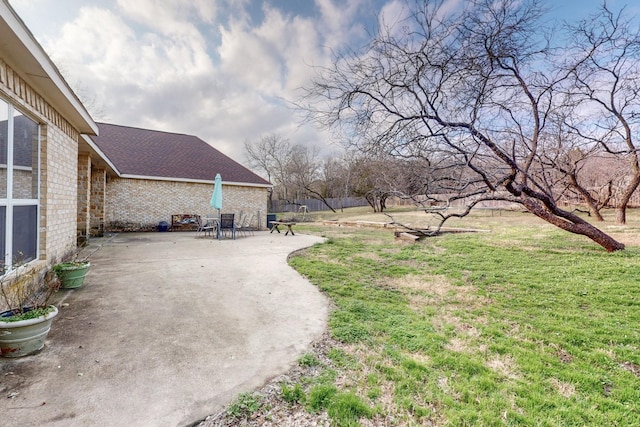 view of yard with a patio area