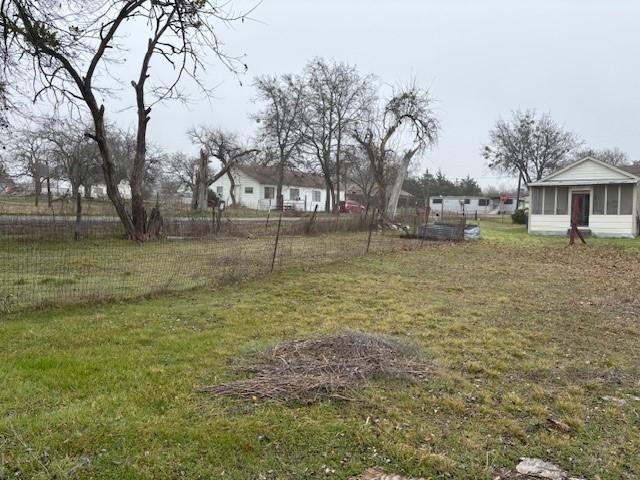 view of yard with a sunroom