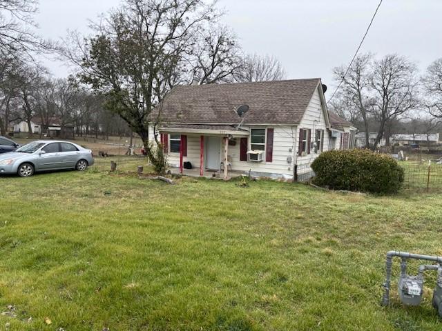 bungalow with a front yard