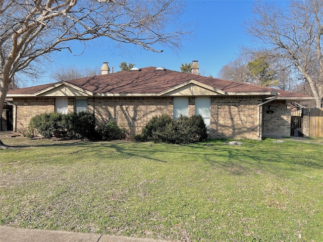 view of home's exterior featuring a yard