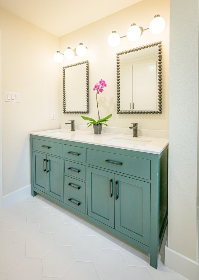 bathroom with vanity and tile patterned floors