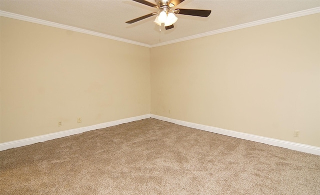 unfurnished room with crown molding, carpet, and ceiling fan