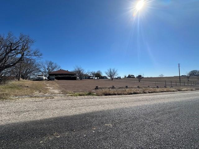 view of street featuring a rural view