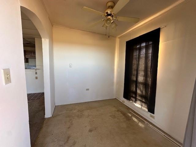 unfurnished room with ceiling fan