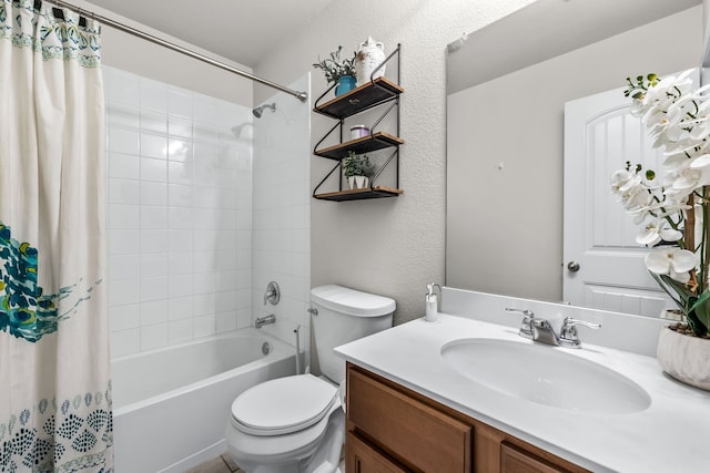 full bathroom with a textured wall, vanity, toilet, and shower / tub combo with curtain