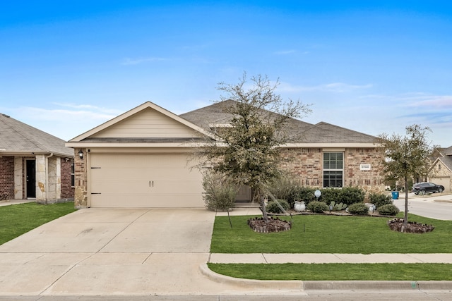 ranch-style house featuring an attached garage, brick siding, a shingled roof, concrete driveway, and a front lawn