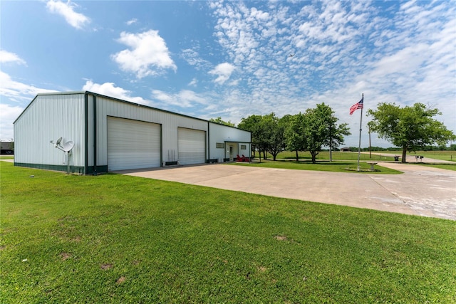 garage with a lawn