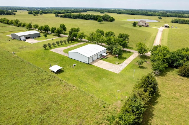 birds eye view of property featuring a rural view