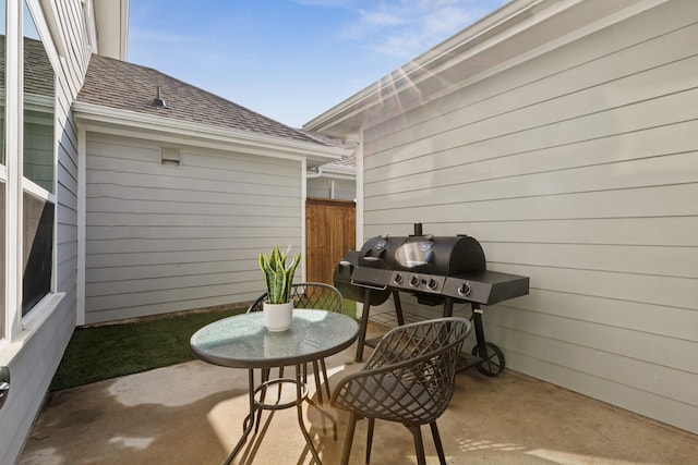 view of patio / terrace featuring fence