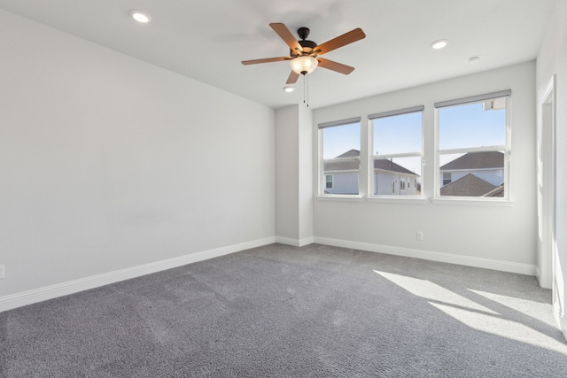 unfurnished room with carpet floors, recessed lighting, baseboards, and a ceiling fan