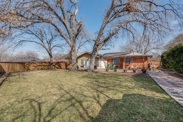 view of yard with fence