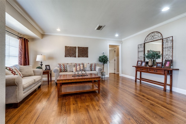 living room featuring visible vents, crown molding, baseboards, recessed lighting, and wood finished floors