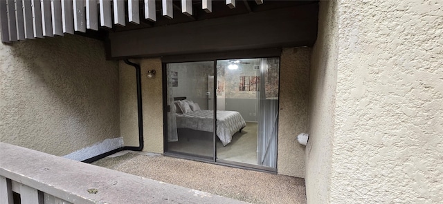 entrance to property featuring a balcony