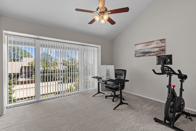 office space with lofted ceiling, ceiling fan, and light colored carpet