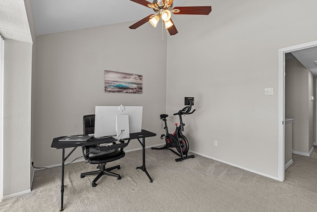 office with light carpet and ceiling fan