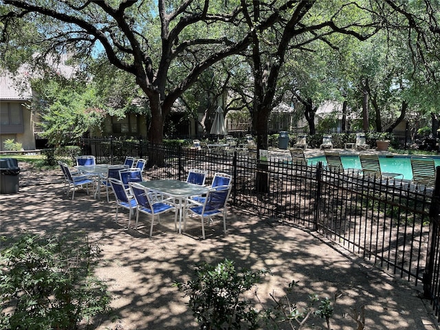 view of patio featuring a community pool