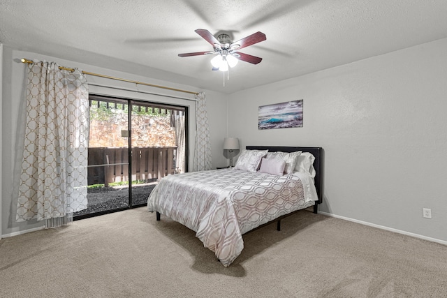 bedroom featuring carpet, ceiling fan, access to outside, and a textured ceiling