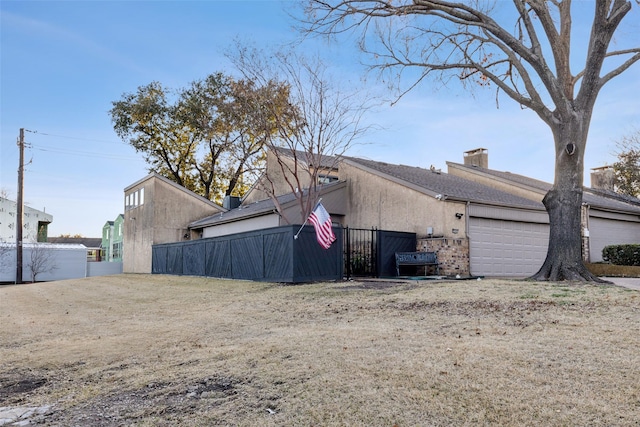 view of side of property featuring a garage