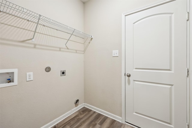 clothes washing area with washer hookup, hardwood / wood-style flooring, and hookup for an electric dryer